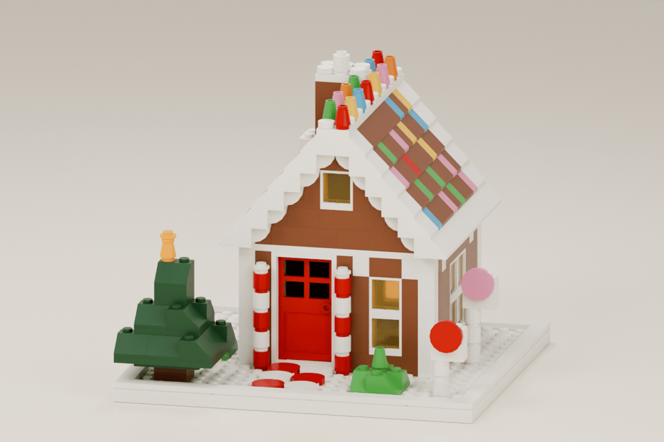 A brick-built gingerbread house with candy on the roof, icing on the gables and a snowy base